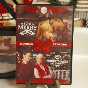 A Very Merry Toy Store & Four Christmases And A Wedding Lifetime DVD (EUC)